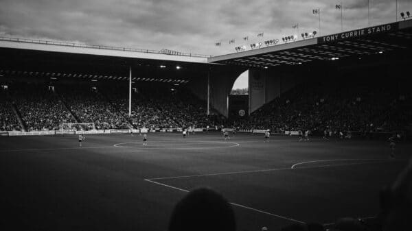 a group of people playing a game of soccer