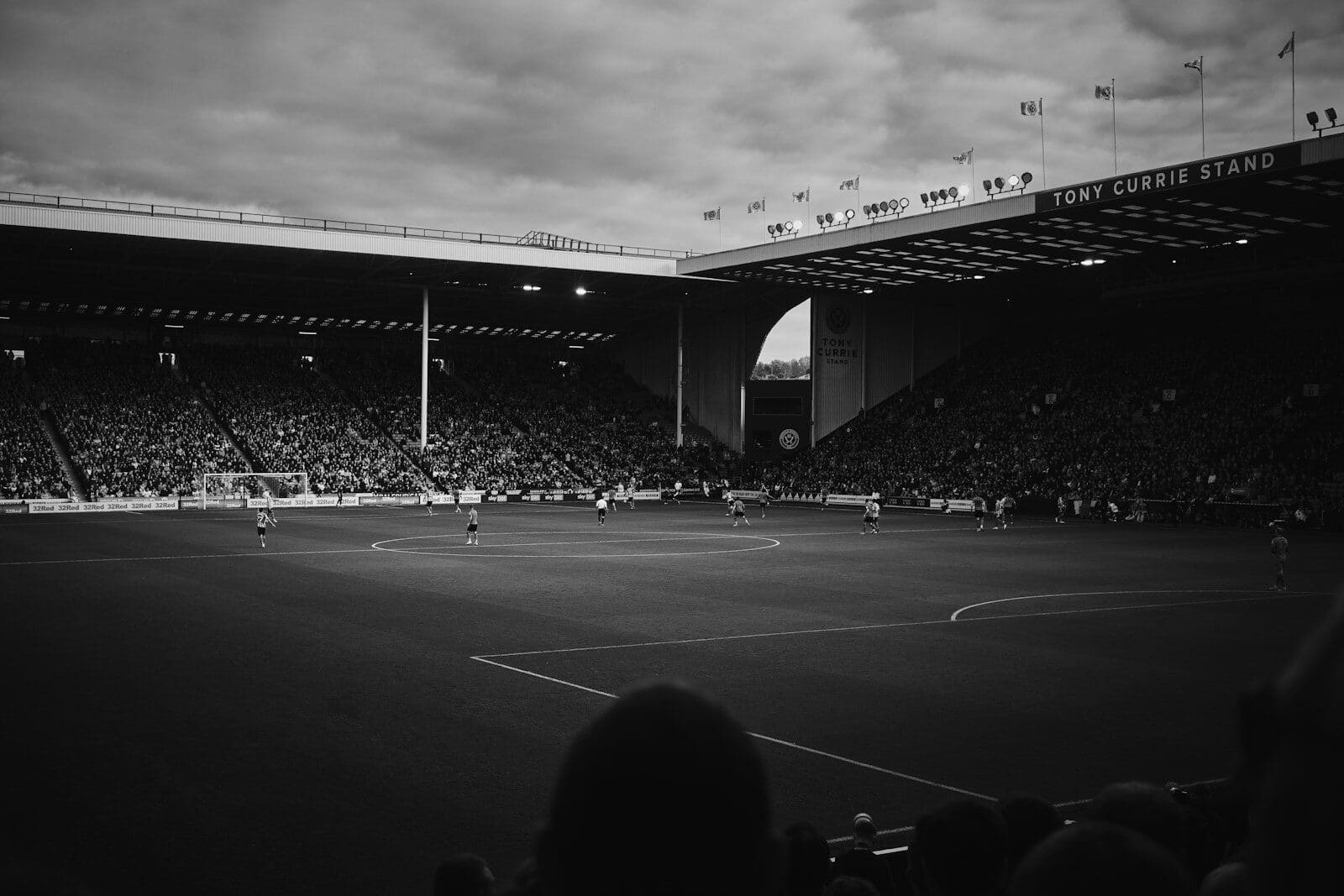 a group of people playing a game of soccer